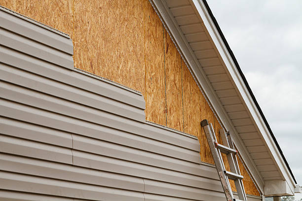 Professional Storm Damage Siding Repair technician working in Brookfield, IL